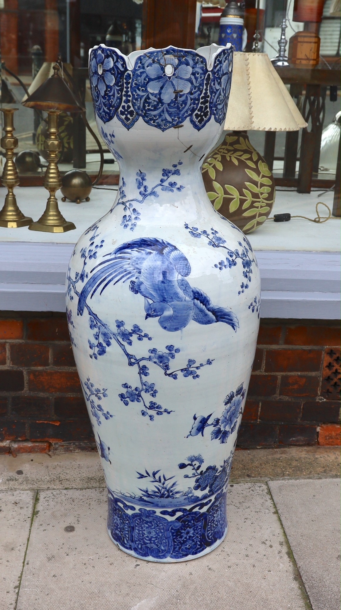 A large Chinese blue and white vase with lobed pierced rim, decorated with exotic birds on prunus branches, height 108cm (a.f)
